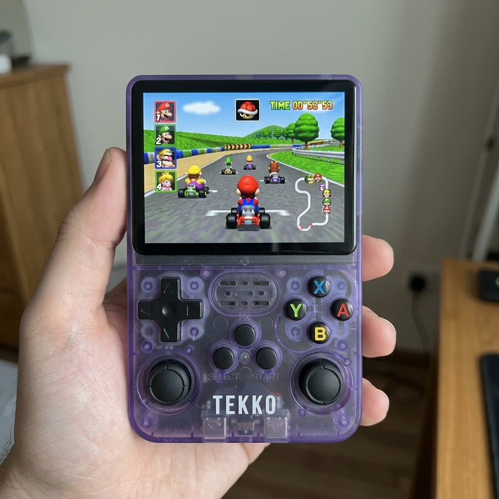 The Tekko One held in hand, powered on and running Mario Kart 64